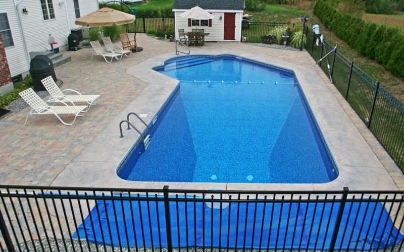 This is a picture of a Custom Lazy L Inground Pool installed by julianos