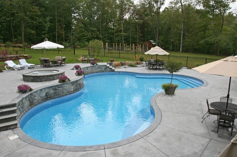 Custom inground pool installed by Majestic Pools